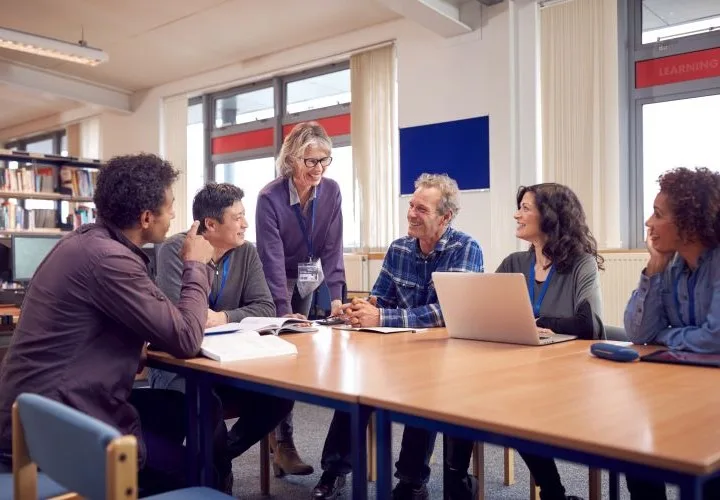 group of teachers having a meeting in a learning environment